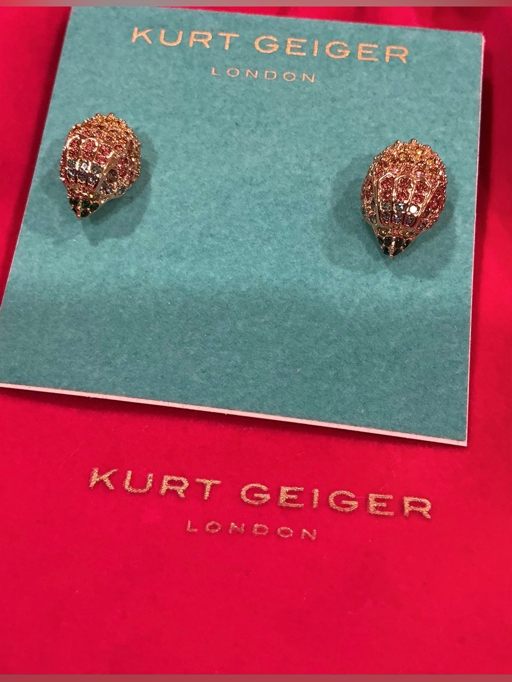 KURT GEIGER LONDON Rainbow pave signature eagle Stud Earrings in Gold tone